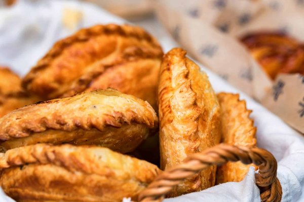 Can You Prepare a Delicate Russian Pirozhki with Cabbage and Egg Filling?